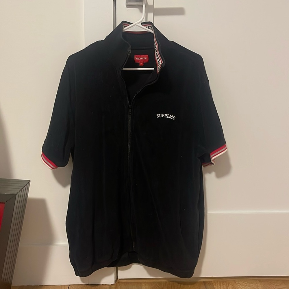 AUTHENTIC SUPREME black terry cloth short sleeve shirt.